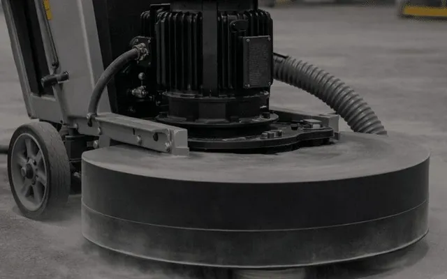 Floor grinder polishing concrete surface