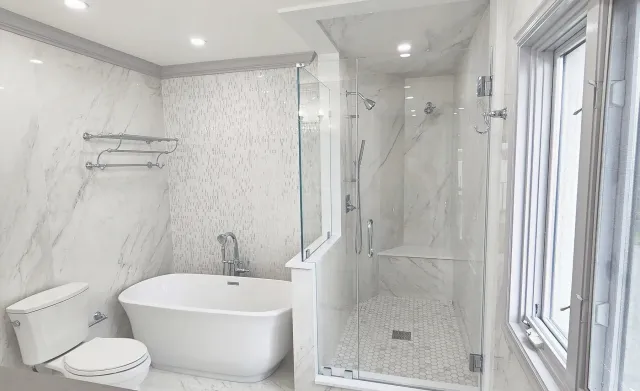 Luxury bathroom remodel with glass-enclosed shower — Vascontractors, Fairfield County CT general contractor