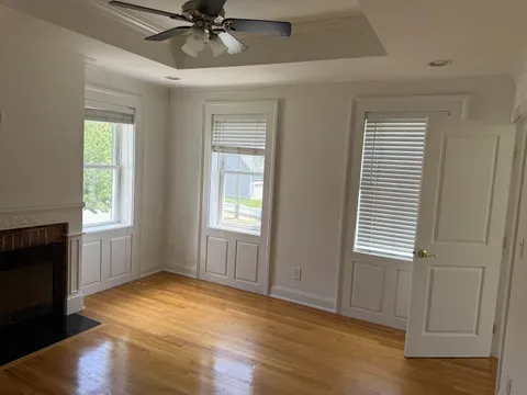 A bedroom in a Connecticut home after a clean