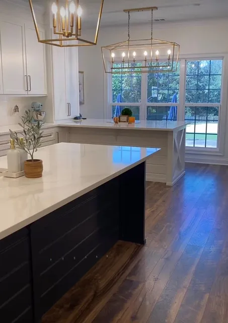 Quartz island, pool-view kitchen — Reno Art Construction project