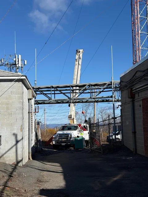 boom truck brick buildings, Andrus Power Solutions