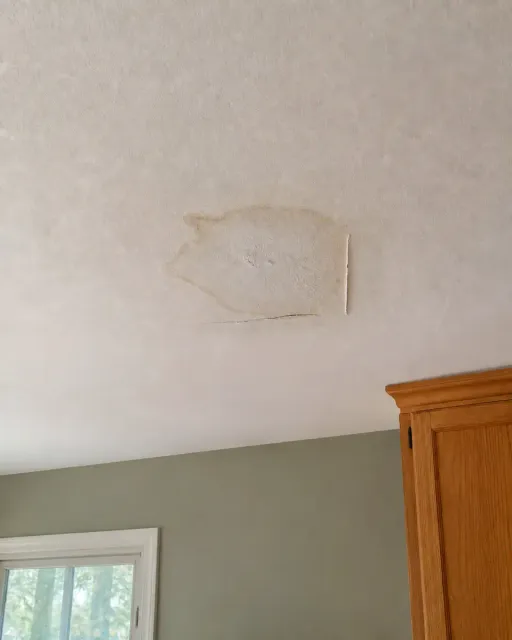 Water-stained ceiling before the repair