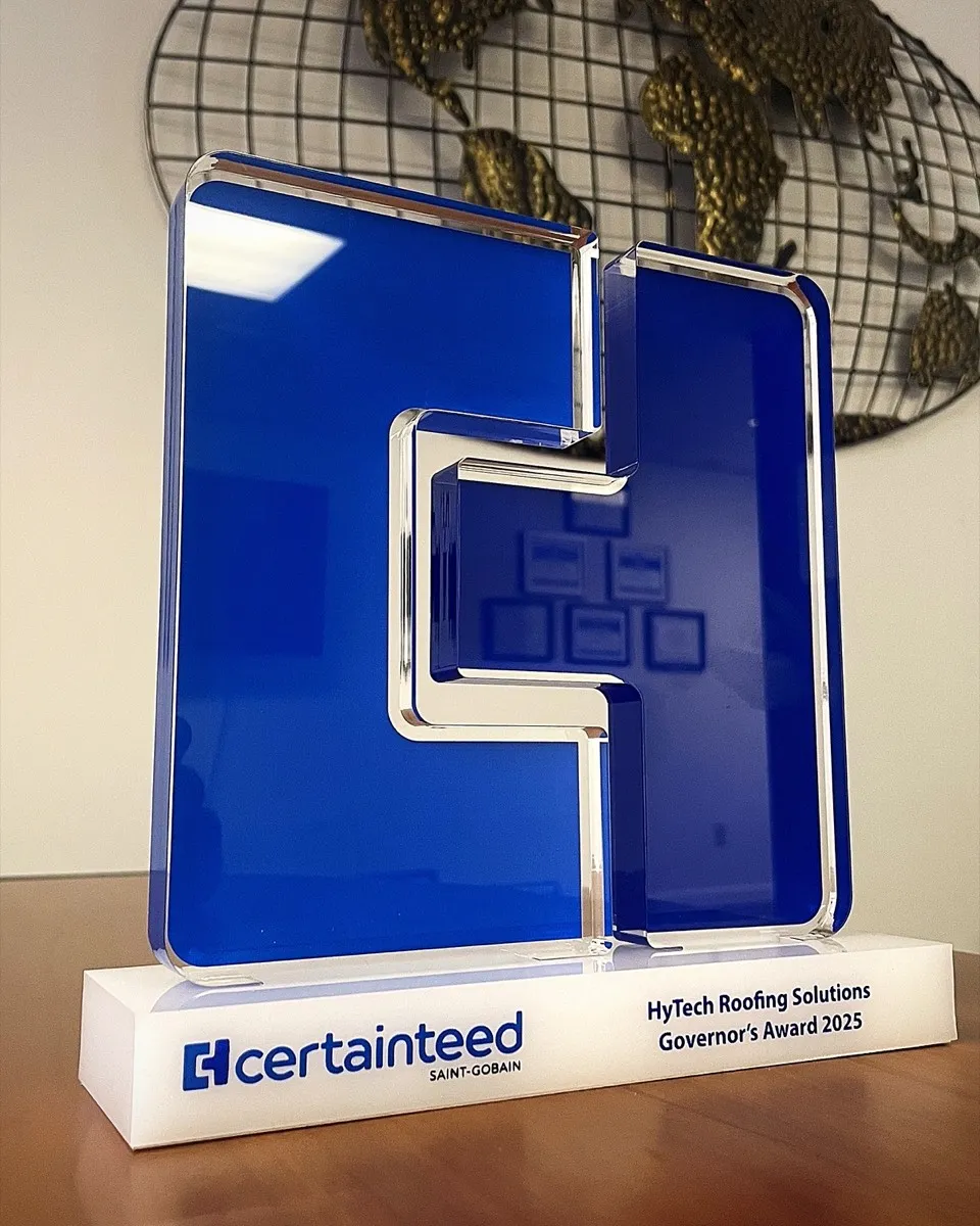 HyTech Roofing Solutions holding the CertainTeed Governor's Award 2025 trophy