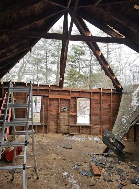 A ladder is in the attic of a house under construction