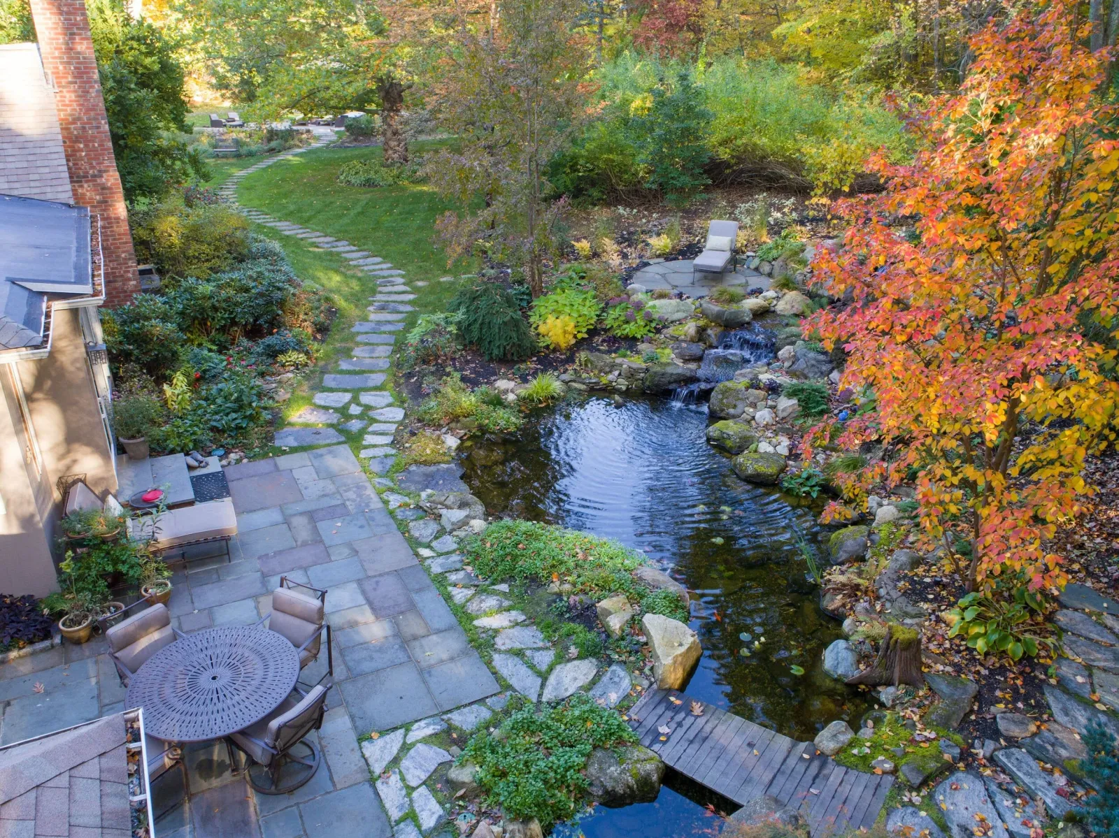 Landscape+Design+&+Construction,+Water+Feature+Designer+&+Builder,+&+Certified+Aquascape+Contractor+in+Boston+Massachusetts+_+Koi+Pond+Builders+Massachusetts+_+Outdoor+Water+Garden+_+Backyard+Streams,+Ponds,+&+Waterfalls+_+Beautiful+Ba (7).jpeg