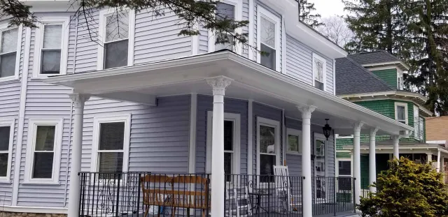 Home with gutters and porch