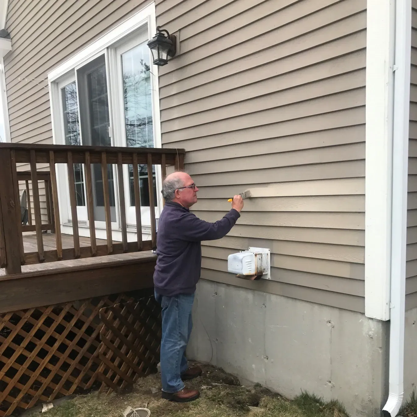 Man Painting — Beverly, MA — GLENN BATTISTELLI CONSTRUCTION, LLC