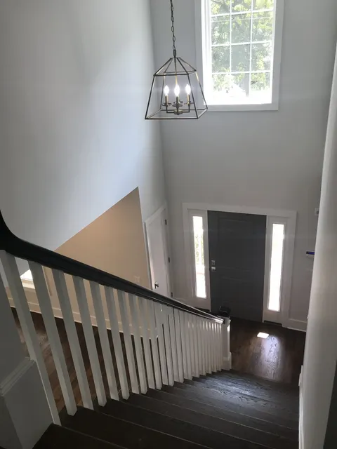 Custom staircase leading to the entry