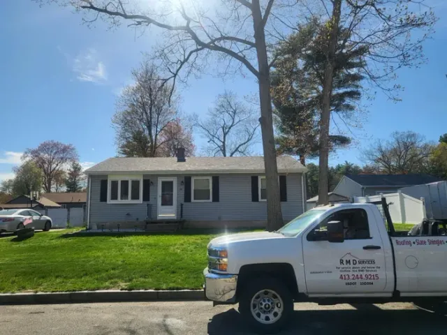 A Blue And White Truck With The Word Services On The Side — Brimfield, MA — RMD Services, Inc.