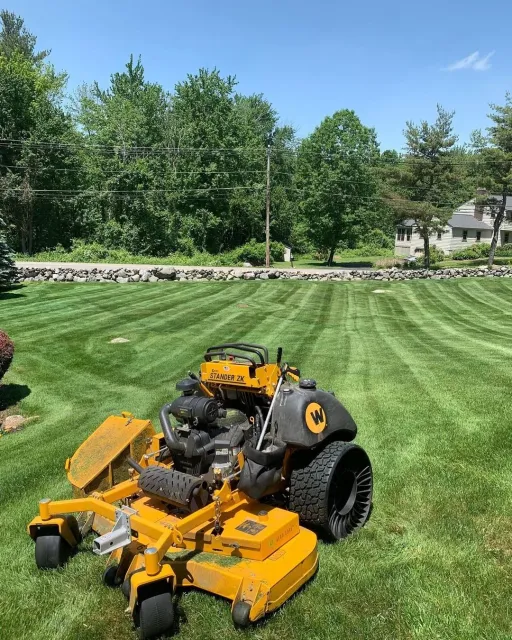 Freshly cut lawn in Groton, MA by Gardner's Landscaping, LLC