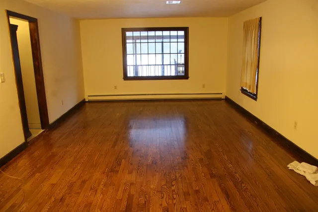 Refinished oak floor in a living room
