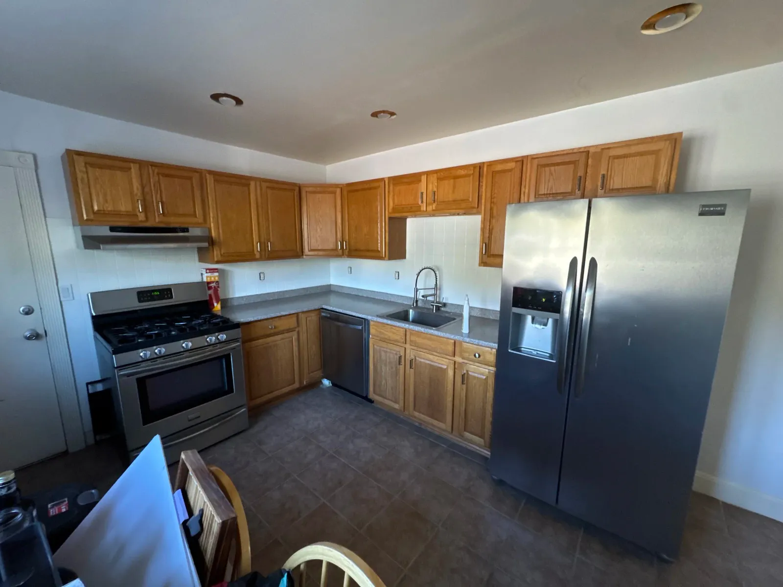 Kitchen Cabinet full repaint inn Somerville MA by Slim's Painting