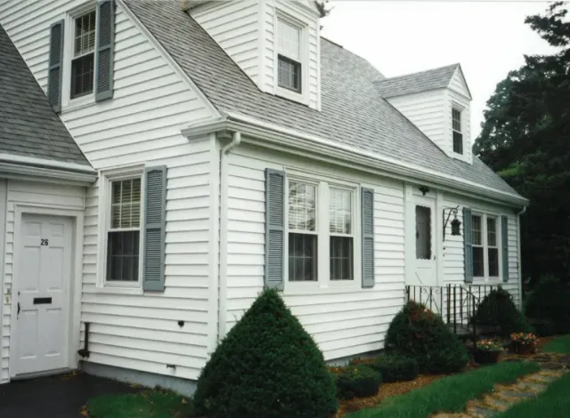 Man Removing Dirt On Gutter — Raymond, ME — The Gutter People