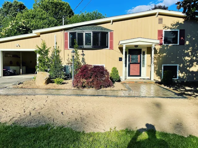 What a transformation, some smaller plants to save a little green that will grow along with this family into a the perfect front entranceway! Great job my our design team creating a plan to replace the front beds and walkway that works with our customers budget and an even better execution job by our crew!