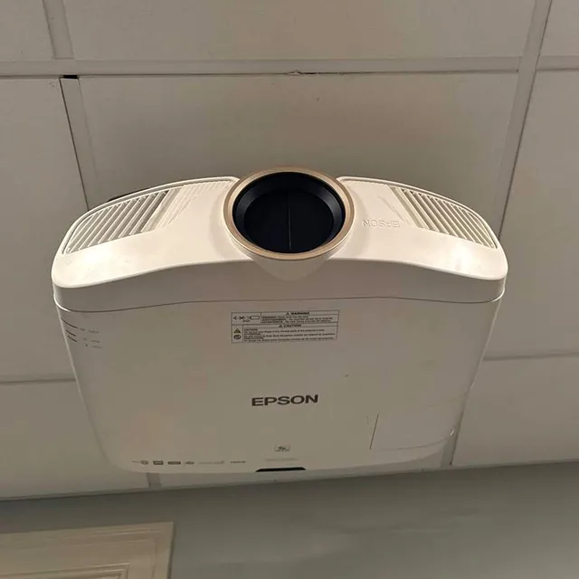 Ceiling-mounted projector for a home theater