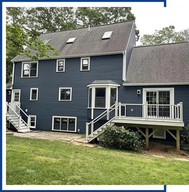 Blue House With A Deck — Raynham, MA — JDM Siding And Windows