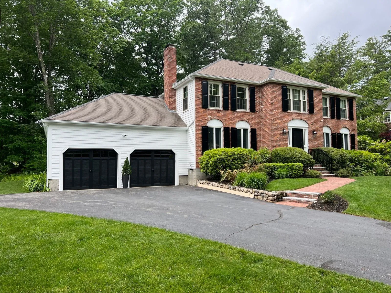 Exterior repaint - brick Colonial with white garage addition