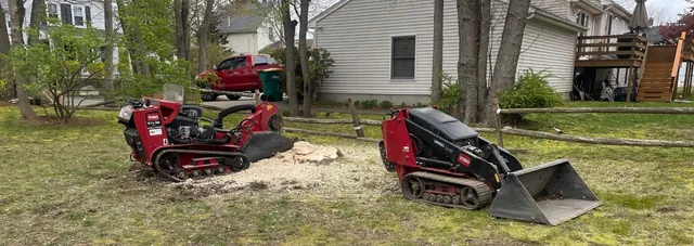 Professional landscaping equipment in action