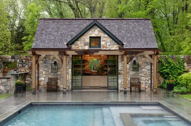 Fieldstone clad pool house