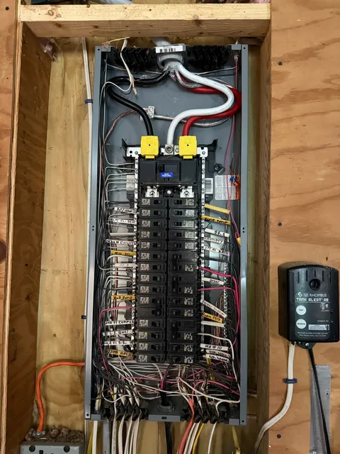 Breaker panel wired to the transfer switch for the standby generator