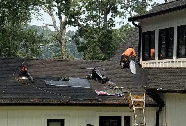Roof repair in progress on a home in Norwalk, CT