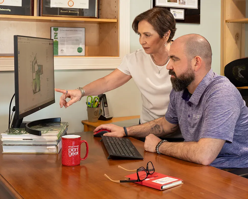 barbara and ben conolly working on garden landscape design