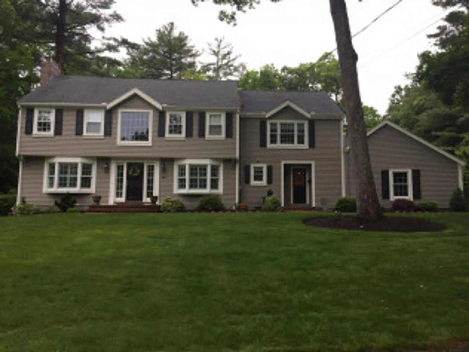 Exterior repaint of a Colonial home