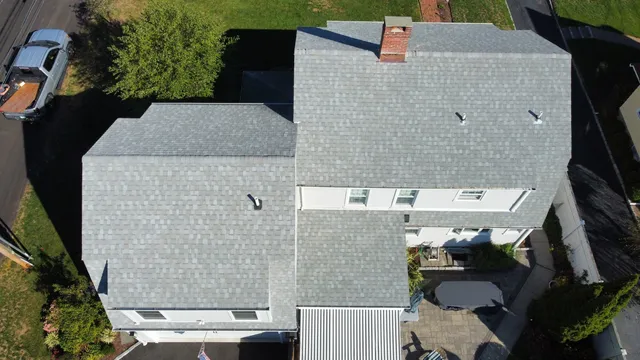 Aerial view of a completed roof replacement by Cooper Modifications in Connecticut