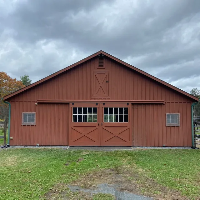 Finished barn/garage with board-and-batten doors