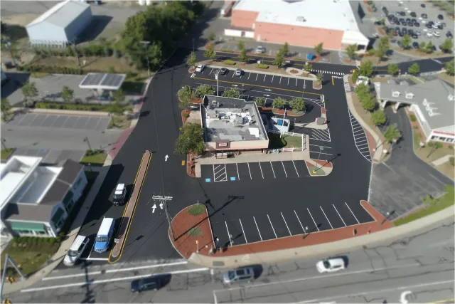An aerial view of a parking lot.