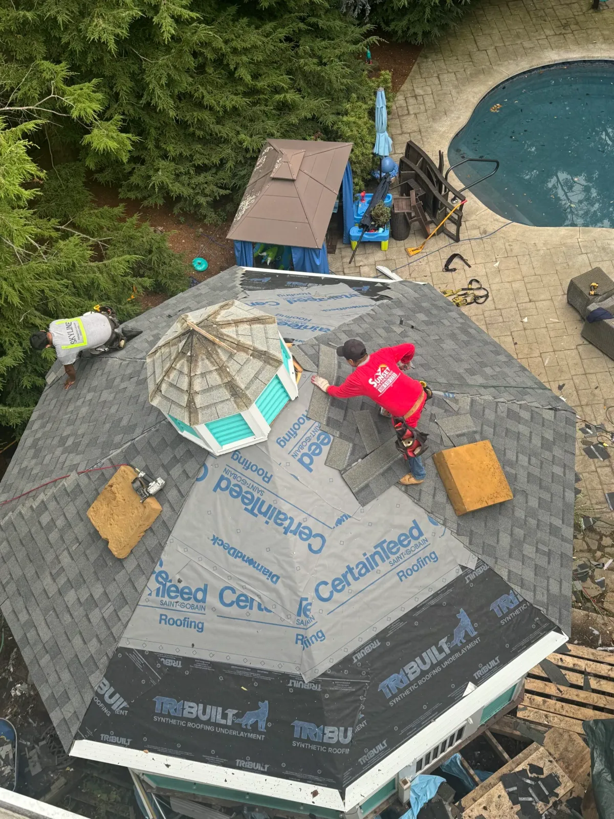 Roofer working on a roof installation in Canton MA