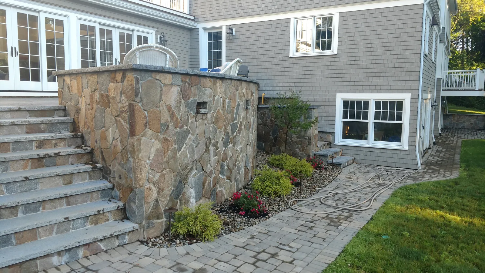Stone walkway and paver path by Stiles and Sons