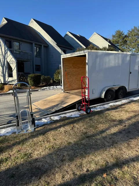 Loaded trailer parked on a residential street in New Hampshire