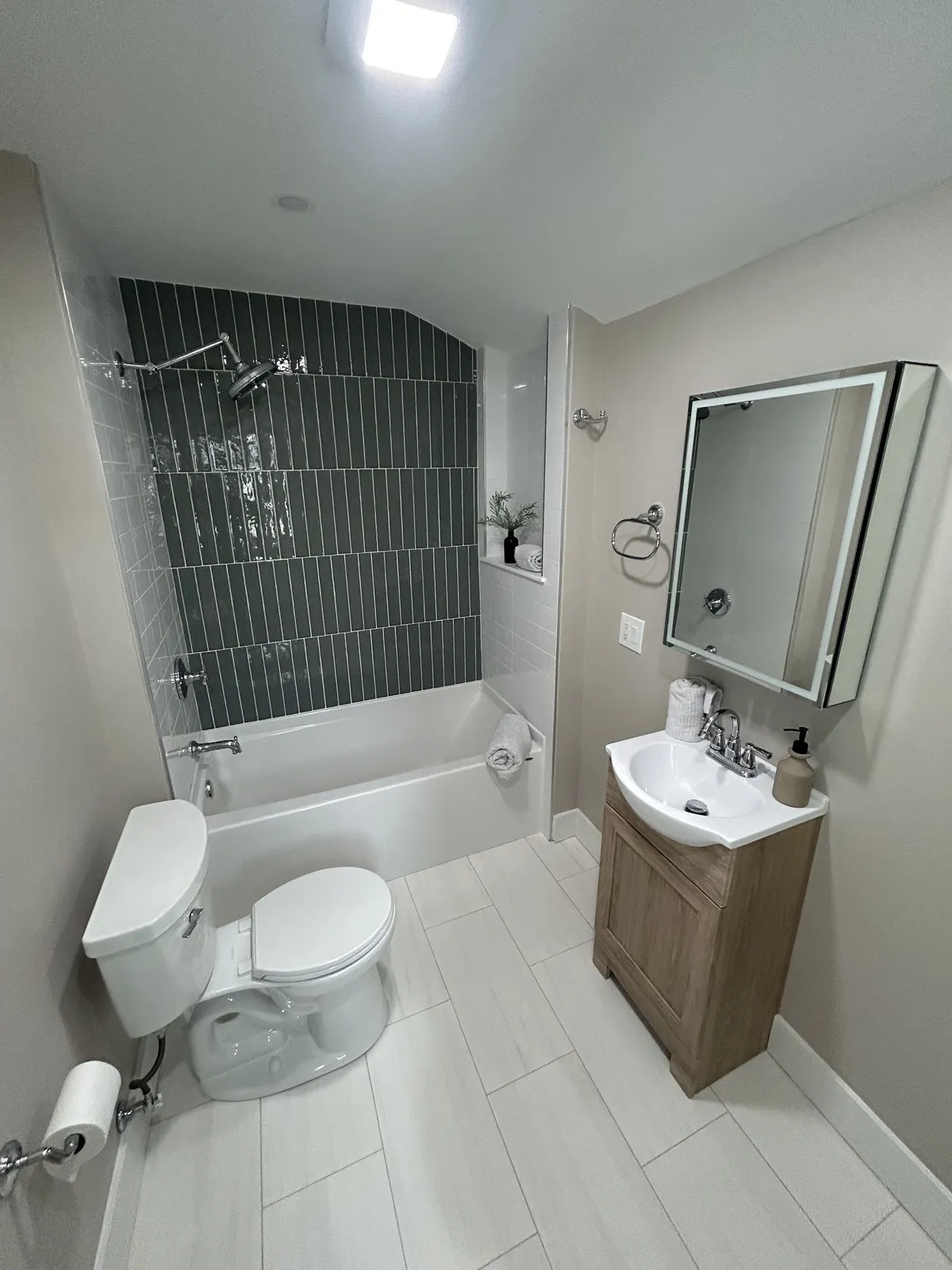 Dark Tile Bathroom — photo 1