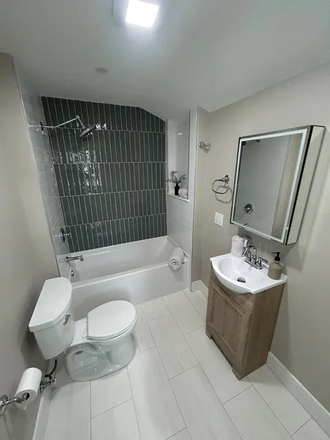 Dark Tile Bathroom — photo 1