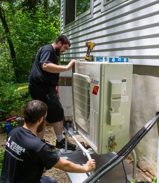 Horizon Homes crew installing a mini-split heat pump