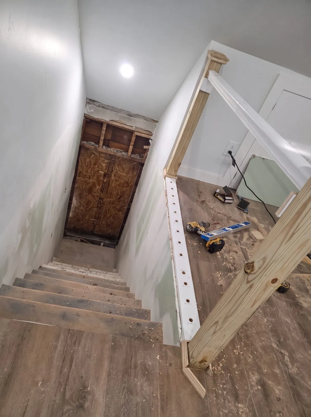 Basement stairwell, framing and board