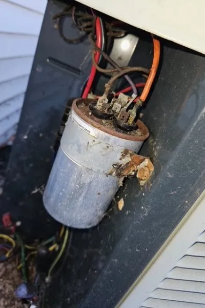 Corroded air conditioner capacitor and wiring