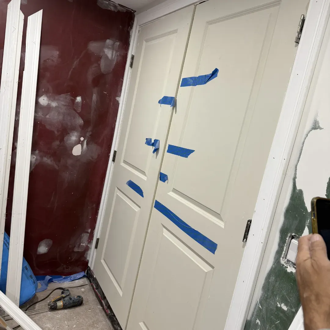 Interior door and wall painting prep with patching in Malden, MA — Tinbercraft Construction