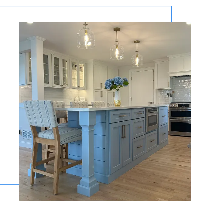 Light blue kitchen island with pendant lights