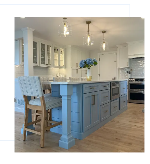 Light blue kitchen island with pendant lights