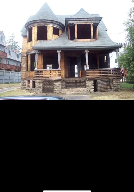 Historic Stamford Victorian before restoration, stripped to the framing