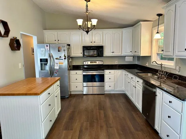 Transforming Your Heart of the Home: Elite Kitchen Cabinet Refinishing in Webster, MA