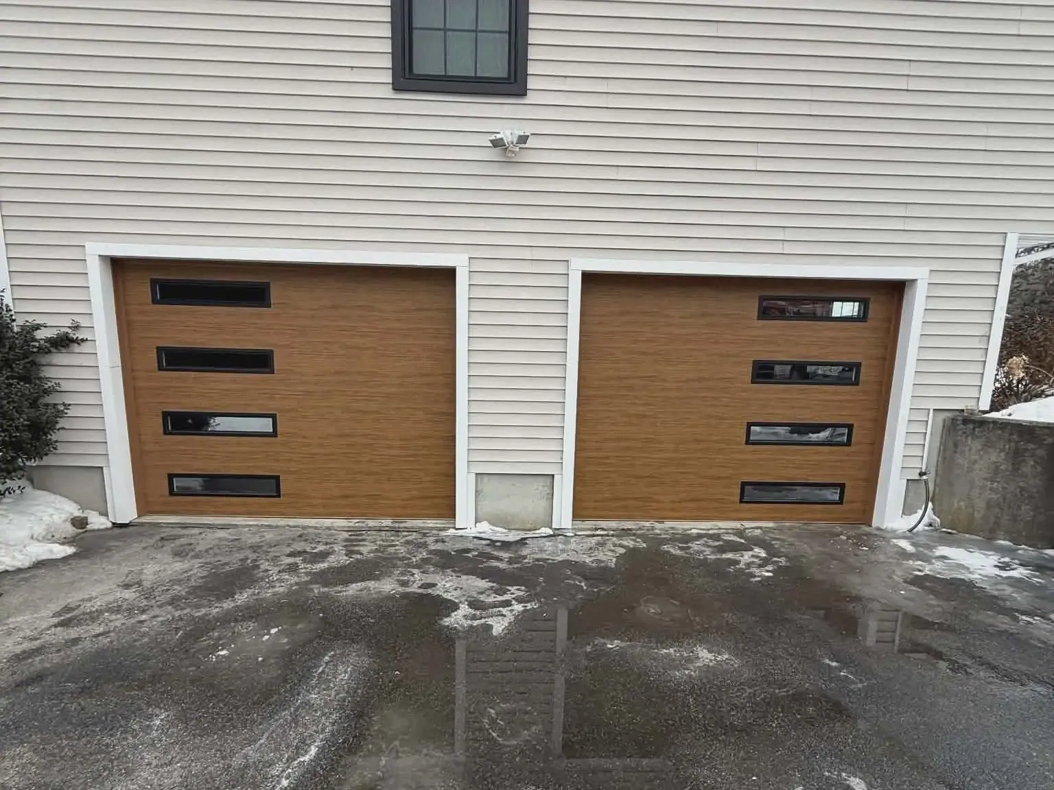 Wood-look plank doors with window accents