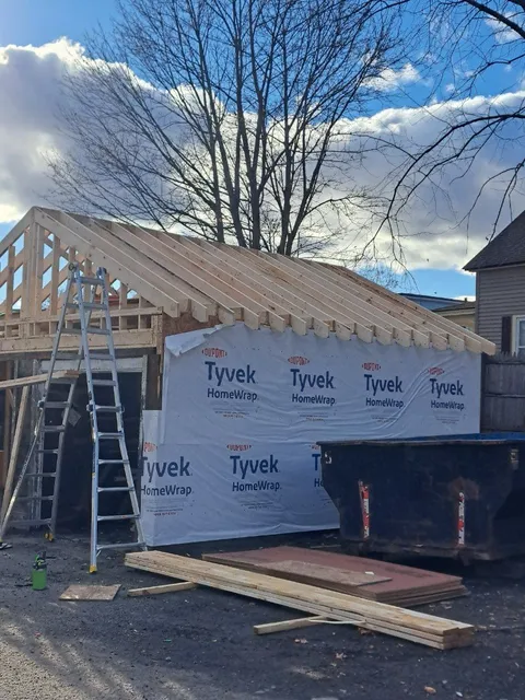 New construction framing and house wrap by general contractor Sutton, MA