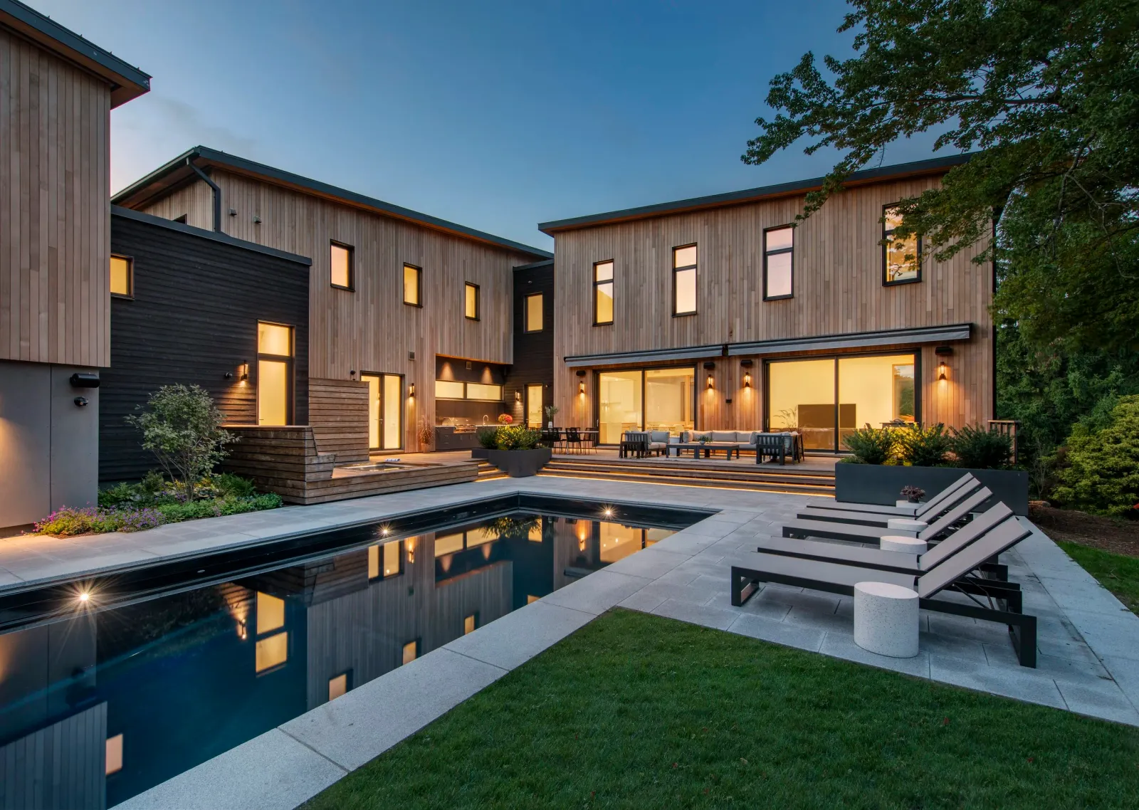 Twilight View of Pool Area at IDDLA's Modern Habitat Landscape