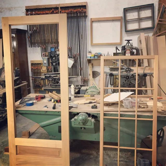 A nice &ldquo;second shift&rdquo; project. A new 12 lite Mahogany storm door, that the client decided they want a screen panel for after all. Had to get a couple pics before paint and glass. This reproduces a original door style elsewhere on the home