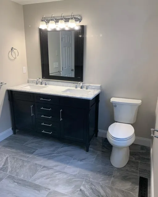 First project of the year is complete! Total update on this bathroom in #grotonma. New vanity, floor tile, custom shower stall with all new fixtures and glass door, new fixtures and paint - even a custom linen closet&hellip;give us a call to get your