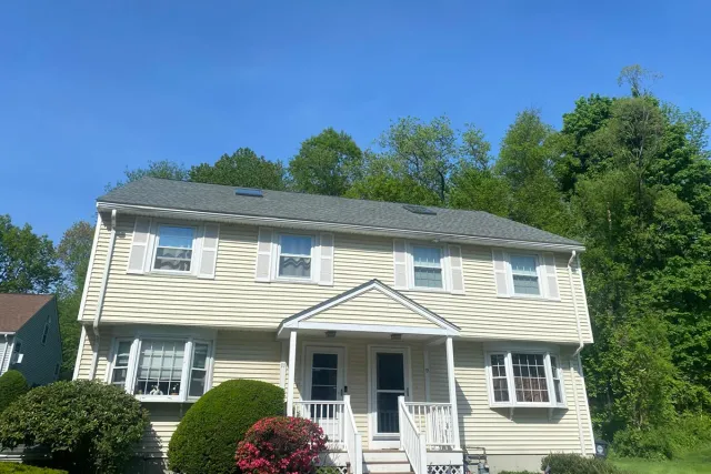 Winter Hill Roofing crew completing a residential project