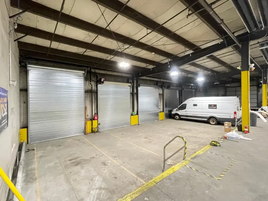 Commercial Overhead Garage Door Installation – Triple A Garage Door Inc.